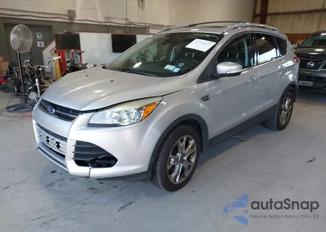 2014 Ford Escape Titanium z USA, uszkodzony, nr VIN 1FMCU9J95EUE19069